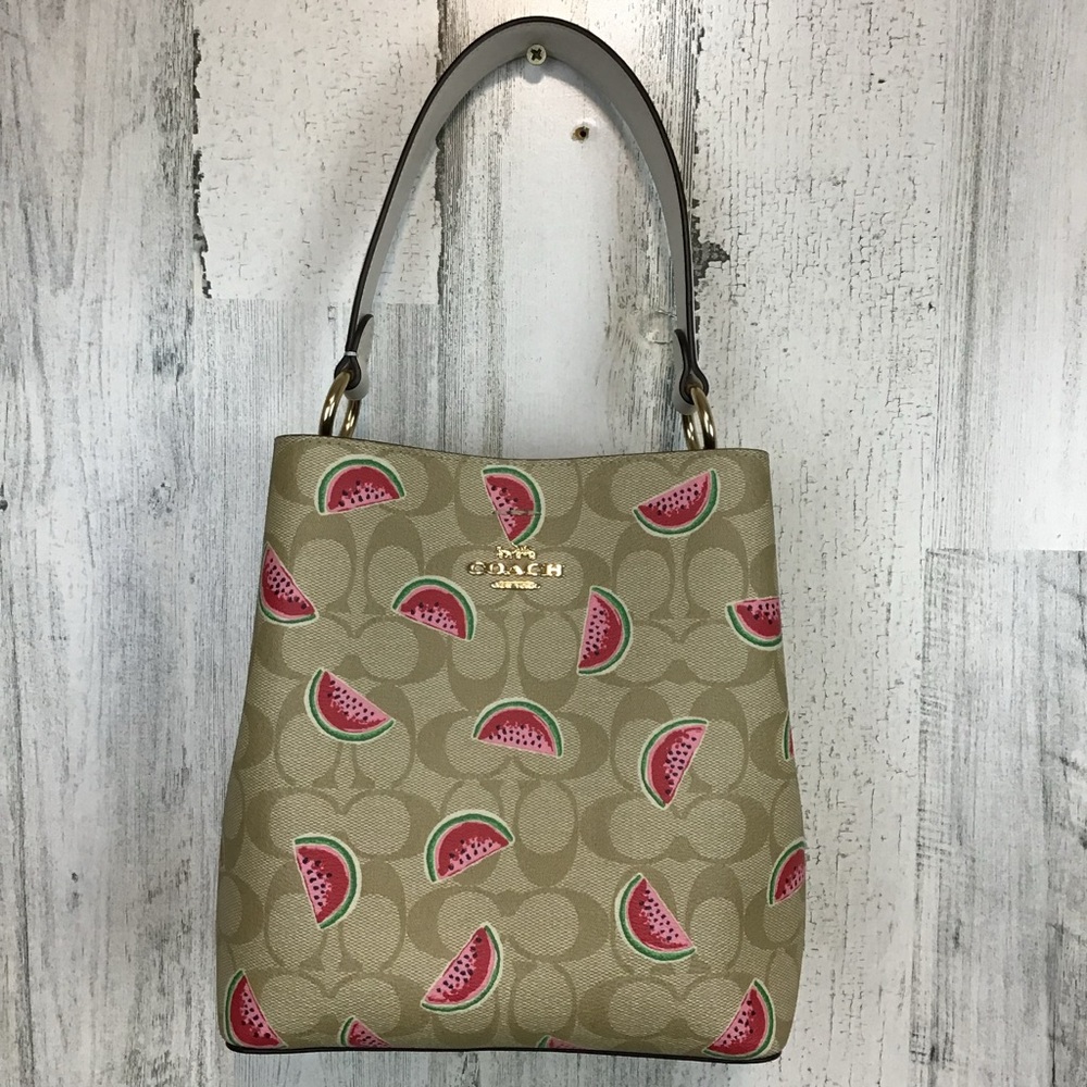 Coach Small Town Bucket Bag in Signature Canvas with a watermelon print. EUC